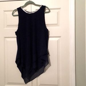 Navy Evening wear fun top. Sleeveless with sequin trim, keyhole button closure.